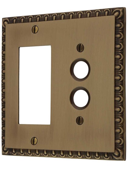 Ovolo Push-Button/GFI Combination Switch Plate in Antique Brass.
